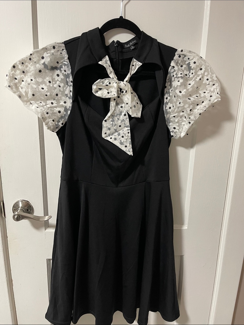 Black Mini Dress with White Floral Puff Sleeves and Bow Tie